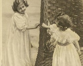 Two Sisters Playing by Wicker Chair Antique French Postcard 1907