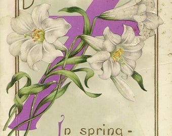 Croix violette de lys de Pâques blancs sur une carte postale de Pâques ancienne 1913 en relief
