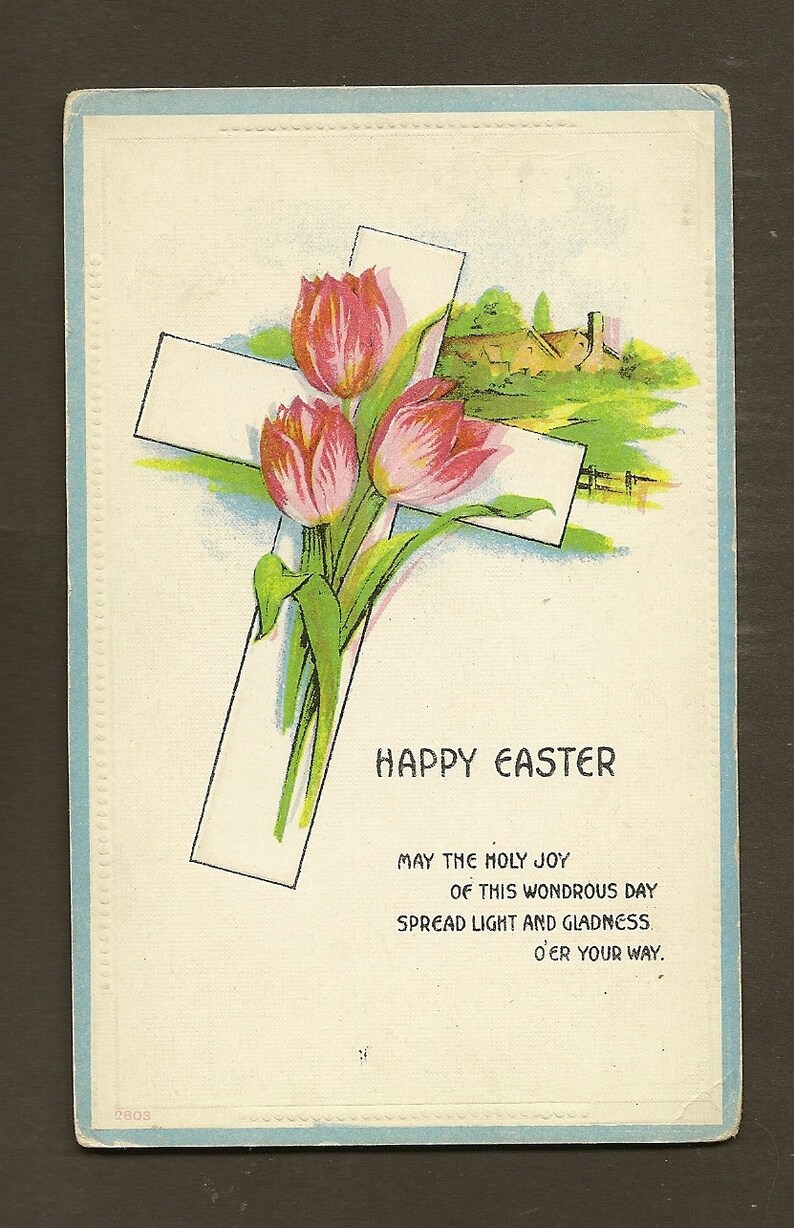 May include: Vintage Easter postcard featuring a white cross with three pink and yellow tulips. The words "Happy Easter" are printed above a poem. The postcard has a light blue border.