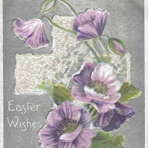 Croix blanche avec fleurs violettes sur fond argenté Carte postale de Pâques antique en relief non utilisée Années 1910