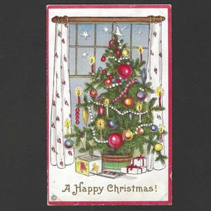May include: Vintage Christmas postcard featuring a decorated tree with ornaments, candles, and a star-filled window backdrop. The tree sits in a green pot with wrapped gifts at the base. The text "A Happy Christmas!" is at the bottom.