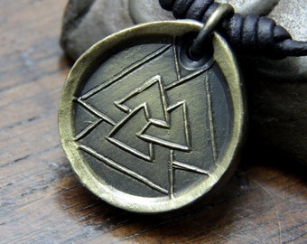 Valknut Hrungnir's Heart Iron Coin Necklace. Norse Viking style medallion pendant that can be personalised with silver inlay or an engraving