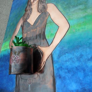 May include: A painting of a woman in a gray dress holding a brown pot with a green plant. The background is a blue and green watercolor wash.