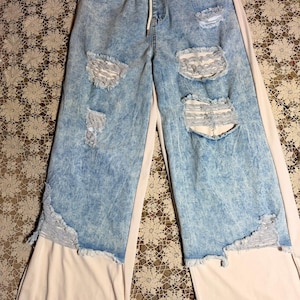 Upcycled handmade patchwork distressed wide leg denim front cream lounge back,