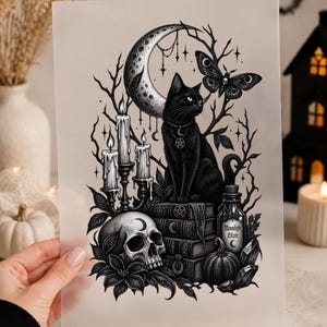 May include: A black and white art print featuring a black cat sitting on a stack of books, a crescent moon, a moth, three lit candles, a skull with a crescent moon symbol, a pumpkin, and a bottle labelled Moonlight Elixir with a crescent moon.