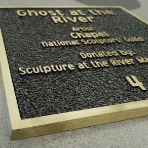 Edge of bronze plaque to show thickness