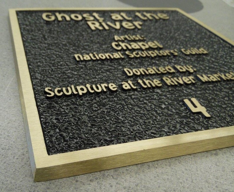 Edge of bronze plaque to show thickness