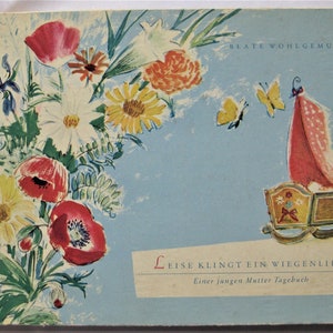May include: A vintage book cover with a floral illustration of red, white, and yellow flowers. The book title is "Leise Klingt Ein Wiegenlied" and the subtitle is "Einer Jungen Mutter Tagebuch".