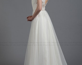 Sleeveless lace wedding dress, V-back alencon lace with tulle skirt.