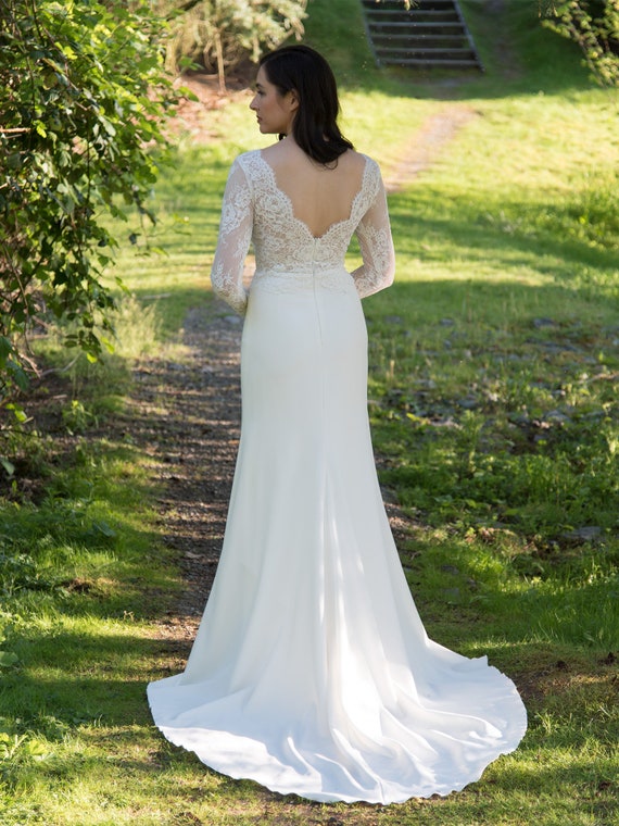 Long sleeve lace wedding dress alencon lace top with crepe skirt fit and flare Long sleeve lace wedding dress alencon lace top with crepe skirt fit and flare