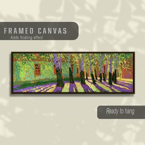 Puede incluir: Un lienzo enmarcado panor&aacute;mico con una pintura de estilo impresionista de un edificio verde rodeado de &aacute;rboles con largas sombras p&uacute;rpuras y amarillas en el suelo. El texto "FRAMED CANVAS Adds floating effect" y "Ready to hang" es visible.