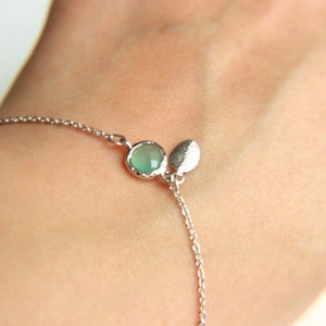 Leaf Bracelet: Rhodium plated leaf charm bracelet with ice blue faceted crystal, a perfect gift for her with minimalist style image 4