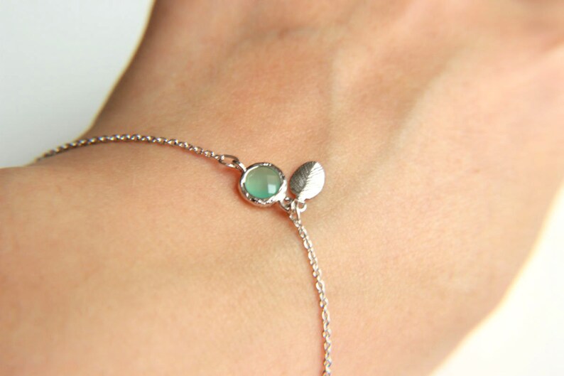 Leaf Bracelet: Rhodium plated leaf charm bracelet with ice blue faceted crystal, a perfect gift for her with minimalist style image 4