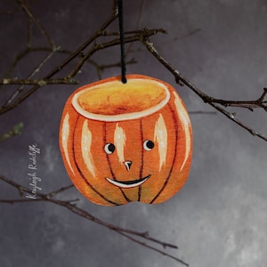Adorno colgante de calabaza de Halloween, de doble cara. Fabricado en madera cortada con láser. Calabaza vintage