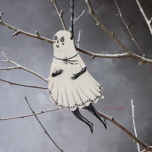 Ghost hanging decoration made from wood. Halloween themed. Illustrated on both sides, made in the UK. "Gary" the ghost