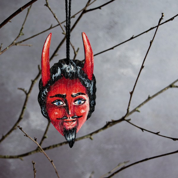 Wooden devil head Halloween hanging ornament. Vintage style