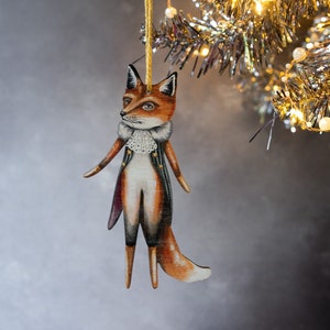 Rudy fox hanging ornament, made from laser cut wood. Double sided design