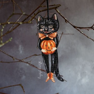 Double sided wooden Halloween hanging ornament of Noir the black cat. Halloween cat decor