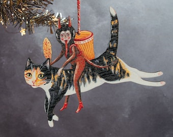 Wooden leaping cat and Christmas Krampus hanging ornament. Double sided, made in the UK from laser cut wood