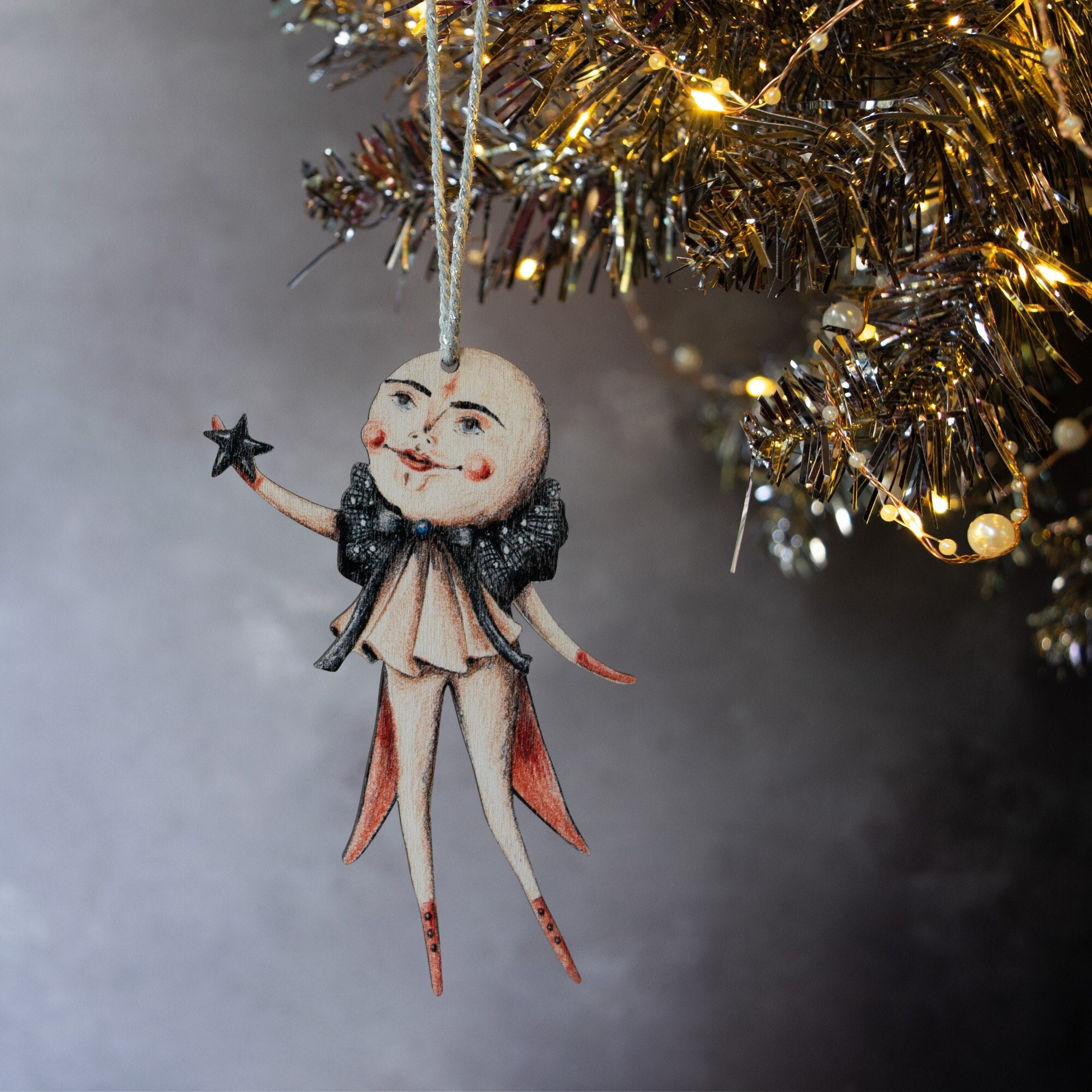 Double Sided Moon Man Wooden Hanging Ornament. Clement the