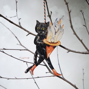 Black cat with a ghost hat hanging ornament. Self illustrated and made from laser cut wood in the UK. Vintage aesthetic Halloween decor