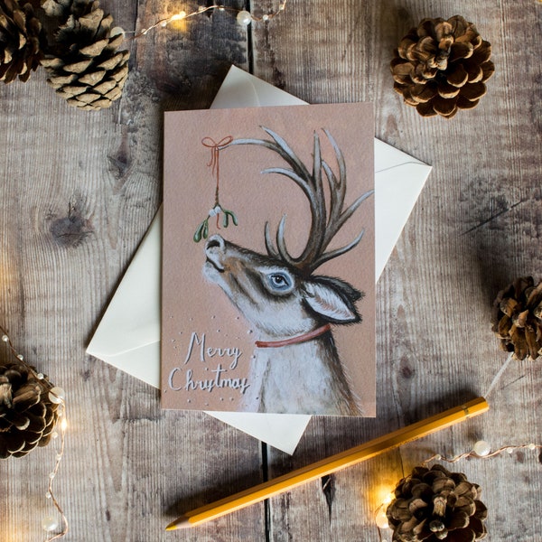 Reindeer and mistletoe illustrated Christmas card. Merry Christmas. Card for a loved one, card for an animal lover. Christmas deer