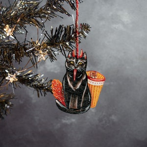 Krampus cat wooden hanging ornament for Christmas. Made in the UK, original design