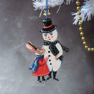 Snowman and rabbit Christmas tree hanging ornament, made from wood. Christmas kitsch. "Clara and Phillip"