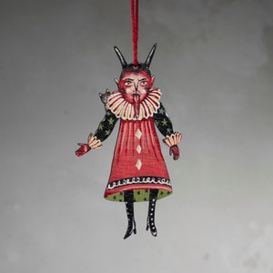 Illustrated wooden hanging decoration of a Devil called Rowan. Vintage style ornament made in the UK