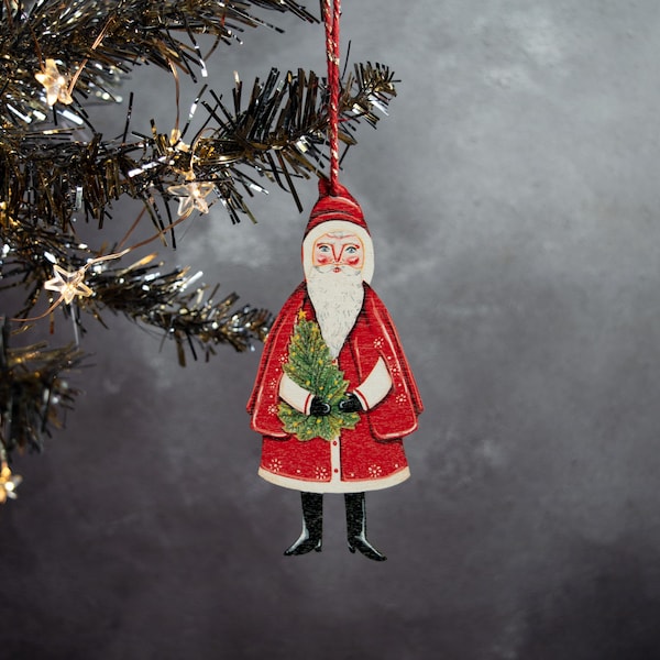 Wooden Father Christmas hanging ornament. Retro Santa holding a Christmas tree, made in the UK