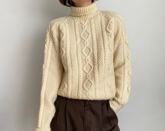 roll neck cut out jumper