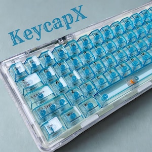 Zestaw przezroczystych nakładek klawiszy Blue Ice – krystalicznie czyste, wiśniowe nakładki na klawisze PC do mechanicznych klawiatur gamingowych z podświetleniem RGB (60–108 klawiszy)