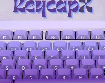 Juego de teclas de perfil bajo moradas con impresión lateral de 127 teclas