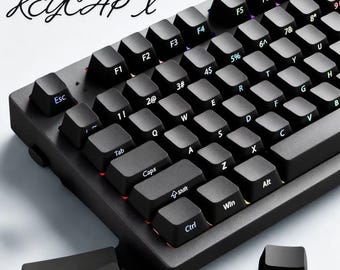 Teclas PBT negras, teclas retroiluminadas, 140 teclas con perfil Cherry, teclas MX translúcidas.
