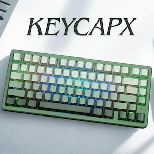 Juego de teclas con degradado verde: PBT con impresión lateral, perfil Cherry, retroiluminación RGB brillante.