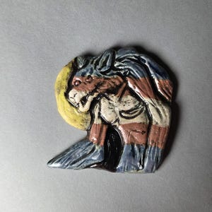 Imán de hombre lobo trans