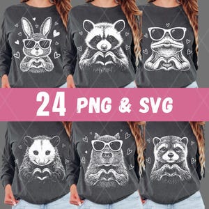 Puede incluir: Camisetas grises oscuras de manga larga con varios animales, incluyendo un conejo, un mapache y una rana, cada uno con gafas de sol y formando un corazón con sus manos. El texto "24 PNG & SVG" se muestra en una pancarta rosa.