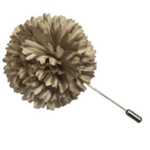 May include: A beige fabric flower lapel pin with a silver pin.