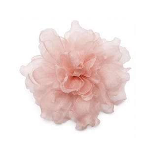 May include: A pale pink fabric flower accessory featuring multiple layers of sheer, translucent petals arranged in a ruffled, circular bloom. The material has a soft, delicate texture with visible edges that create a voluminous, layered appearance.