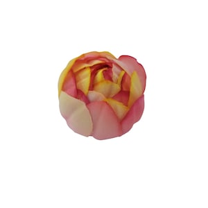 May include: A single, artificial flower with pink and yellow petals. The flower is closed, resembling a bud.