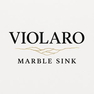 K&ouml;nnte beinhalten: Ein Logo auf wei&szlig;em Hintergrund mit dem schwarzen Text VIOLARO oben und MARBLE SINK unten. Zwischen den beiden Textzeilen befindet sich eine d&uuml;nne, horizontale goldene Liniengrafik, die an ein stilisiertes Gebirge oder ein Adernmuster erinnert.