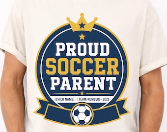 Camiseta personalizada "Orgulloso padre/madre de futbolista" con nombre y número, diseño personalizado para el día del partido de la Copa de Fútbol 2026.