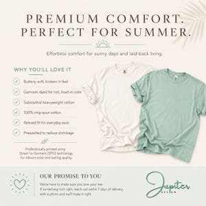 May include: Two short-sleeved crew neck t-shirts, one white and one sage green, displayed alongside text detailing product features including heavyweight cotton, ring-spun fabric, garment-dyed color, and direct-to-garment printing technology.