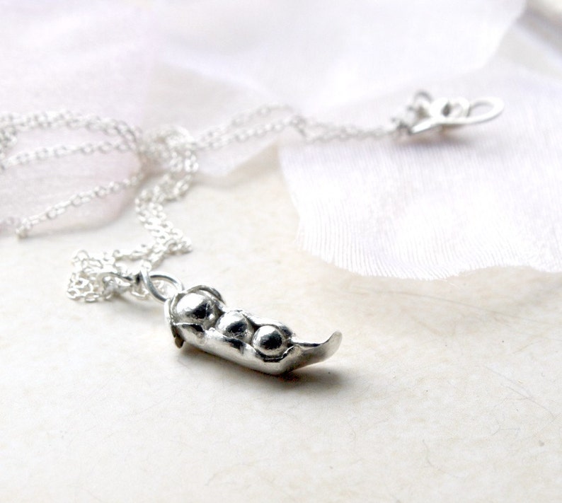 silver peas in a pod necklace