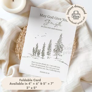 May include: A white rectangular card featuring a black line drawing of pine trees and birds. The text reads: May God Give You Strength as you rest and recover, followed by the Bible verse Isaiah 41:10. A circular badge indicates an instant download.