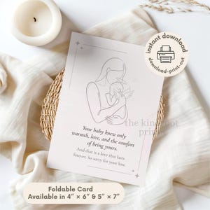 May include: A white rectangular sympathy card featuring a minimalist line drawing of a person holding a baby with angel wings. The text reads: Your baby knew only warmth, love, and the comfort of being yours. And that is a love that lasts forever. So sorry for your loss. Foldable card available in 4" x 6" & 5" x 7".