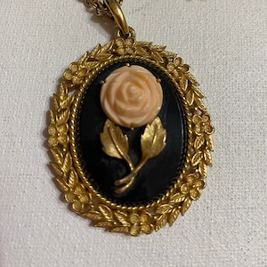 Vintage AVON Rose Gold Leaves Pendant Black Background Gold Trim