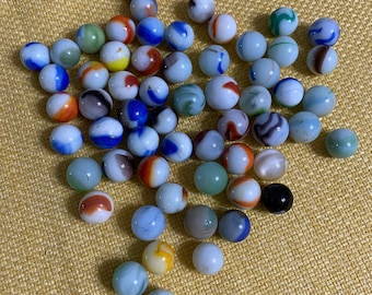+or- 10  POUNDS   OF JABO CLASSICS 5/8 IN MARBLES $42.99 POSTPAID 