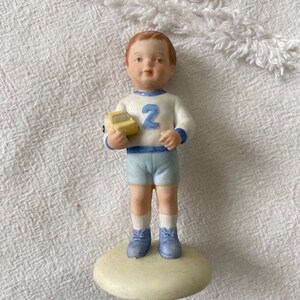 Growing up boy figurines discount