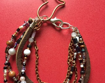 Multi layer beaded and chain bracelet
